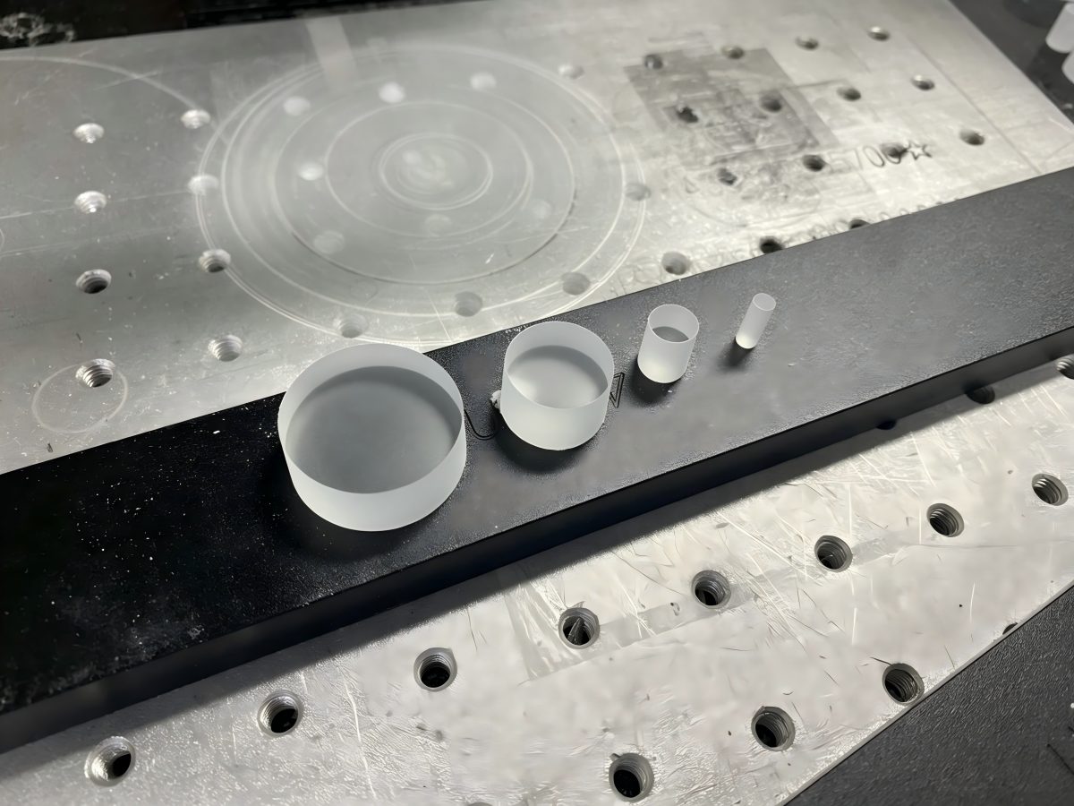 Drilled holes in an appliance glass panel