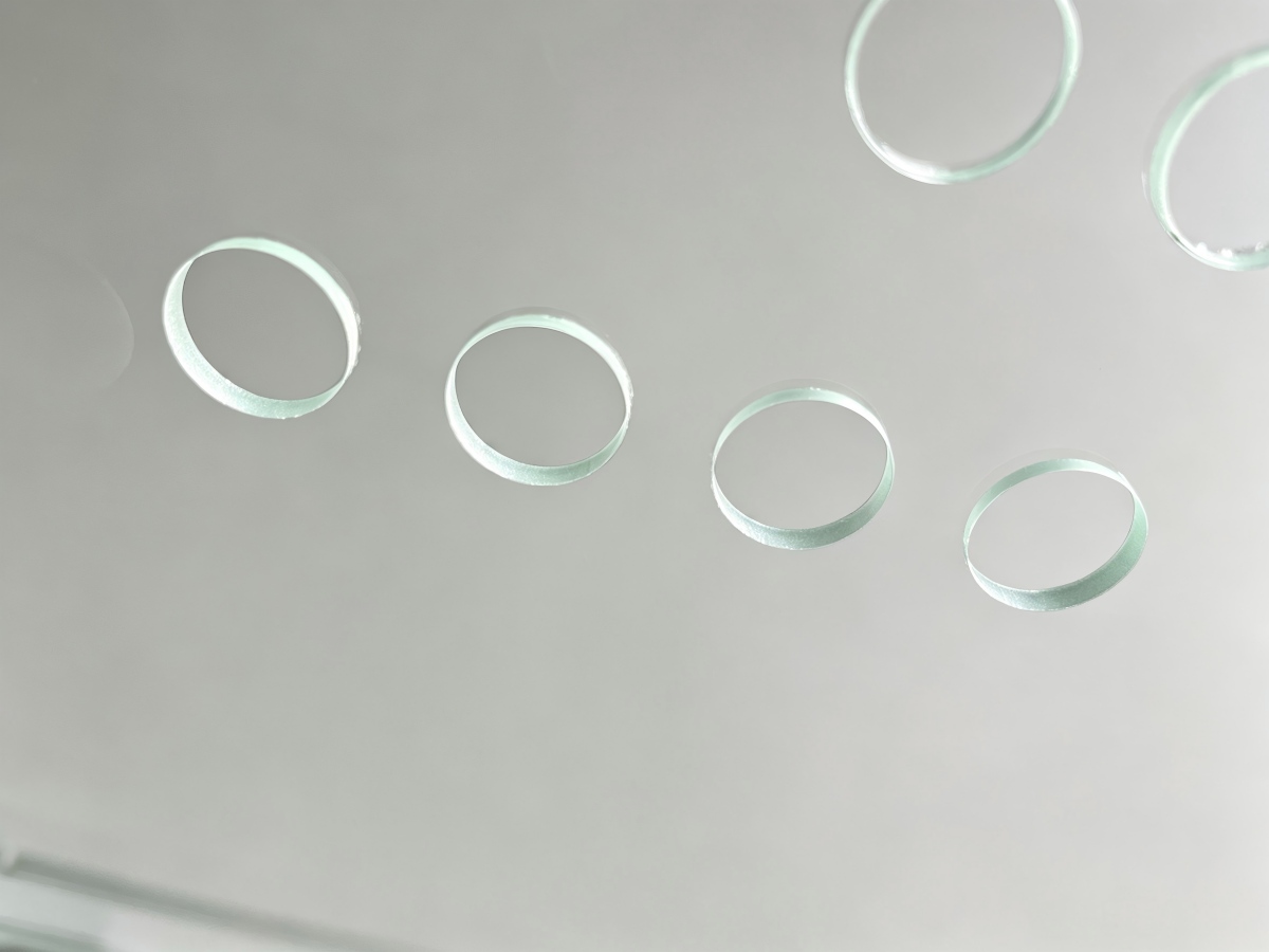 Drilled holes in a kitchen glass panel
