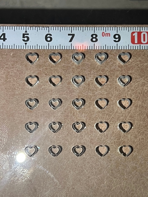 Laser drilled clean crack-free holes in glass sample