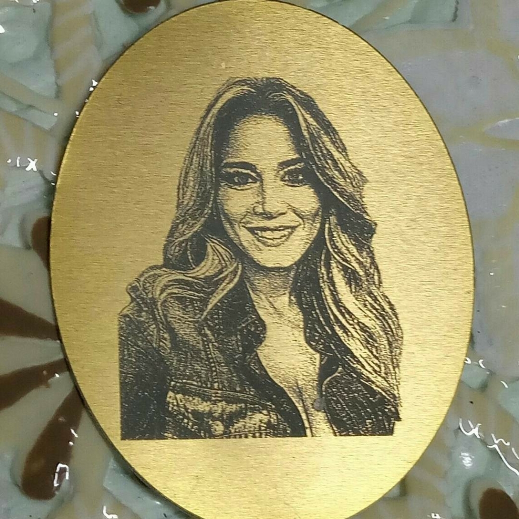 Photo laser engraved on metal sample