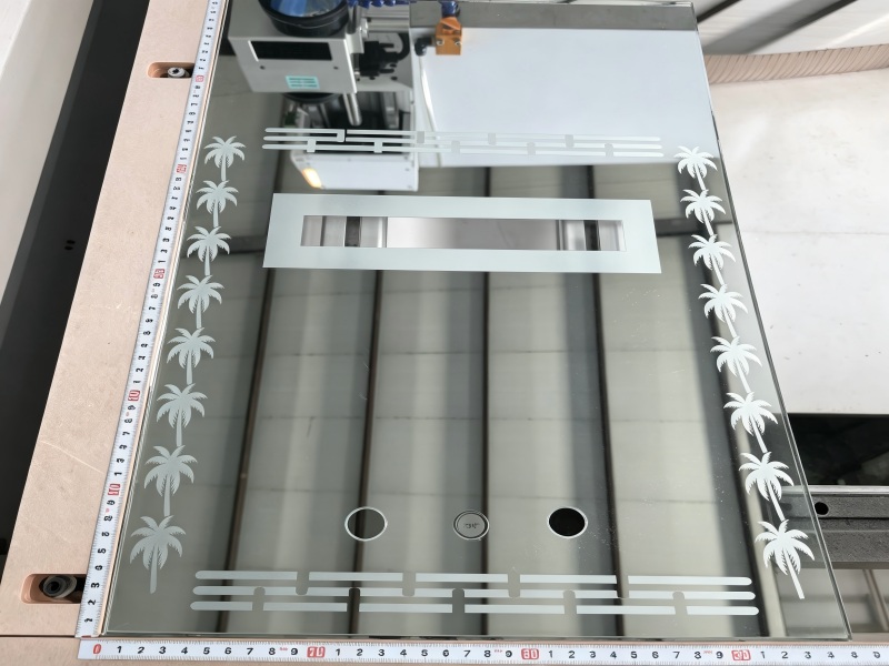 Close-up of fine laser-sandblasting pattern on glass