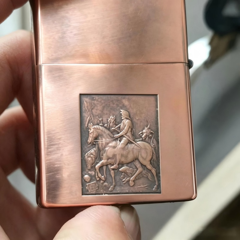 Portrait relief engraved on metal with 2.5D fiber laser