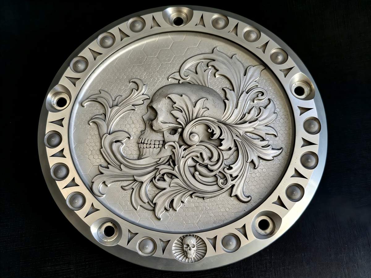 Raised metal relief and artwork on brass and stainless steel by 3D fiber laser