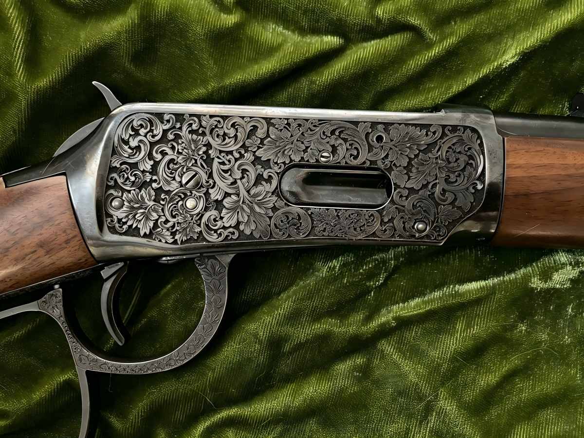 Relief engraving on a firearm receiver by 3D fiber laser marking machine
