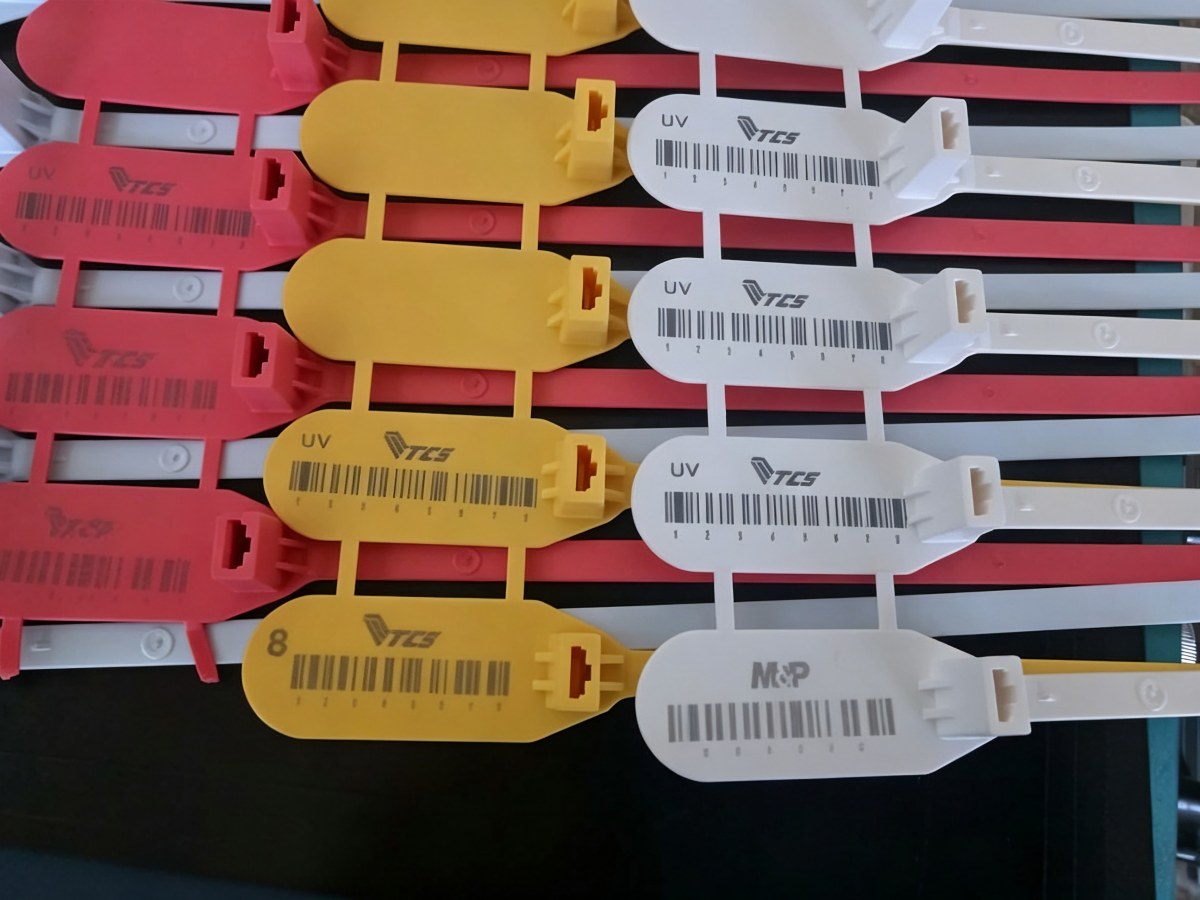 UV laser marking on plastic and coated parts