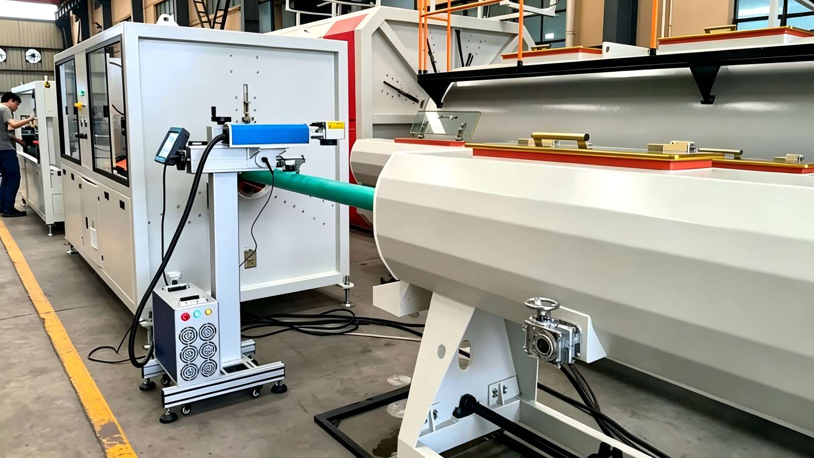 Pipe laser marking machine installed inline on an HDPE extrusion line, positioned after cooling and haul-off